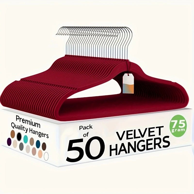 Box of 50 velvet hangers with a red hanger on top