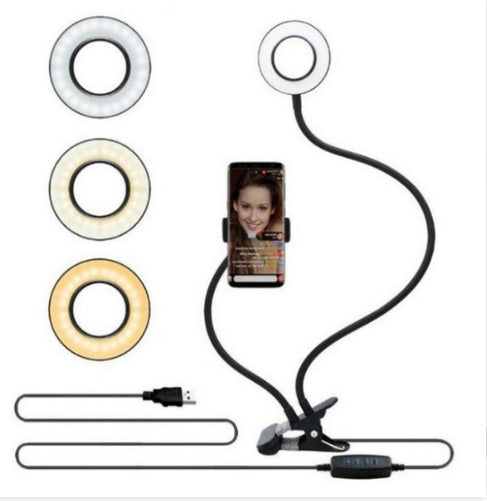 Phone ring light with USB cable and clamp on a white background