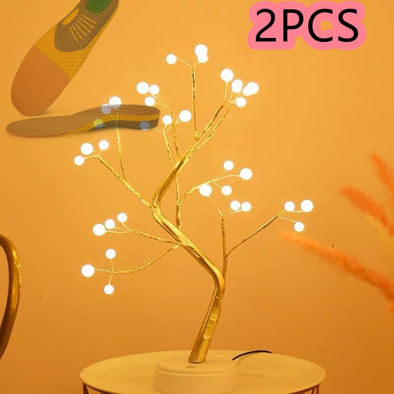 Decorative LED branch light on a stand with '2PCS' label on an orange background