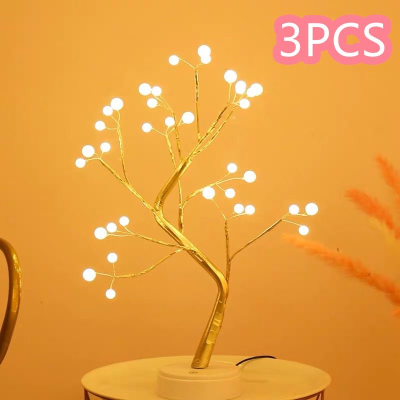 Decorative LED tree with white lights on a yellow background, labeled '3PCS'.