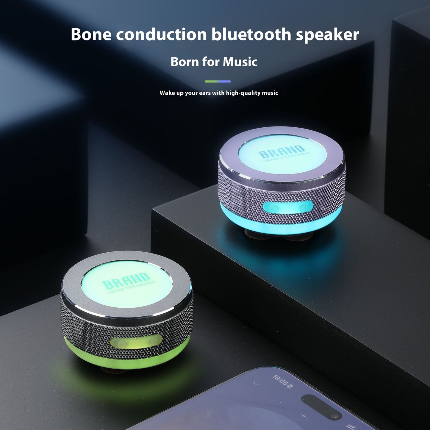 Two bone conduction Bluetooth speakers on a dark surface with text about music.