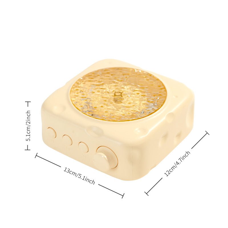 Gold-colored electronic device with circular component and measurement details on a white background