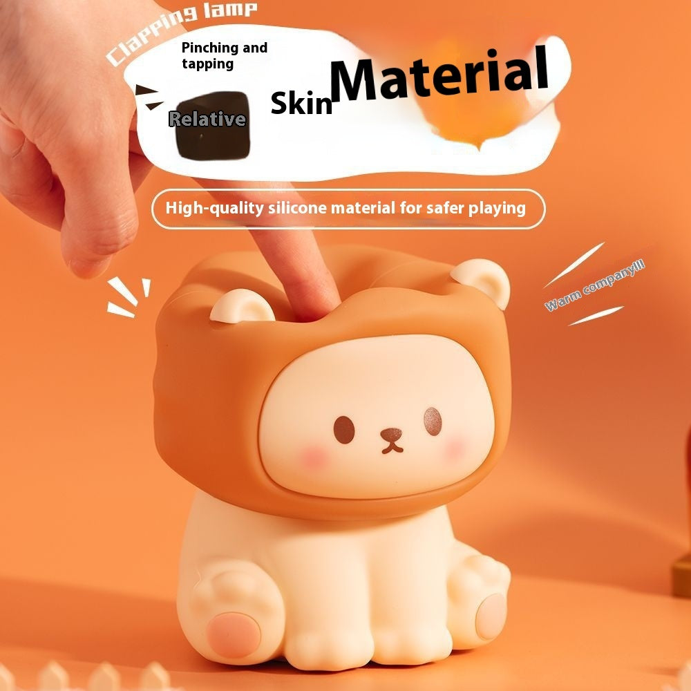 Cute animal-shaped toy with a lion head on an orange background, featuring text about skin material safety.
