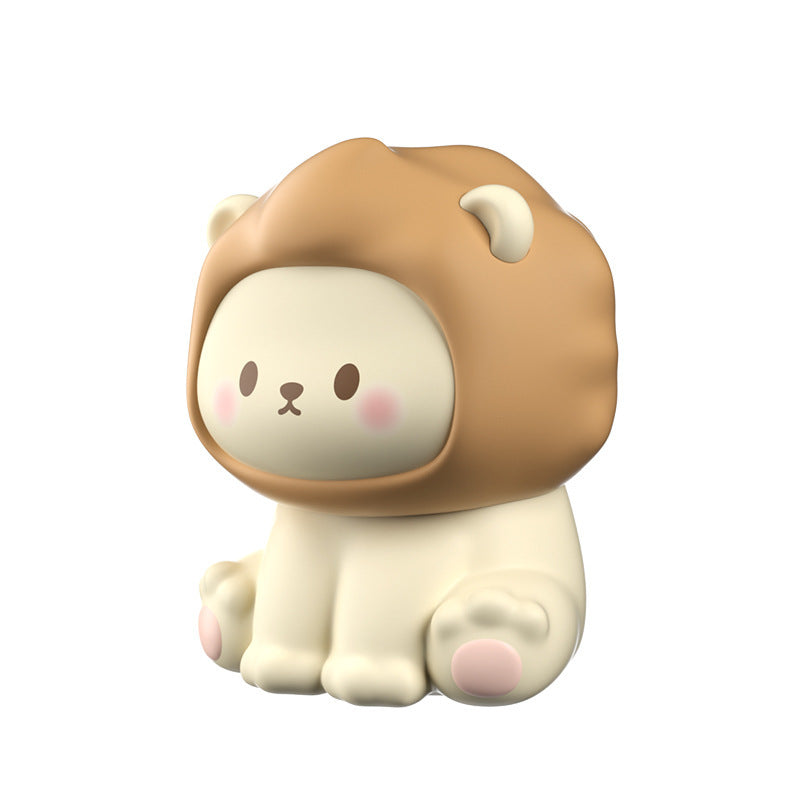 Cute figurine of a lion with a lion mane on a white background