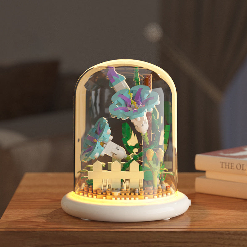 Decorative lamp with colorful design on a wooden surface