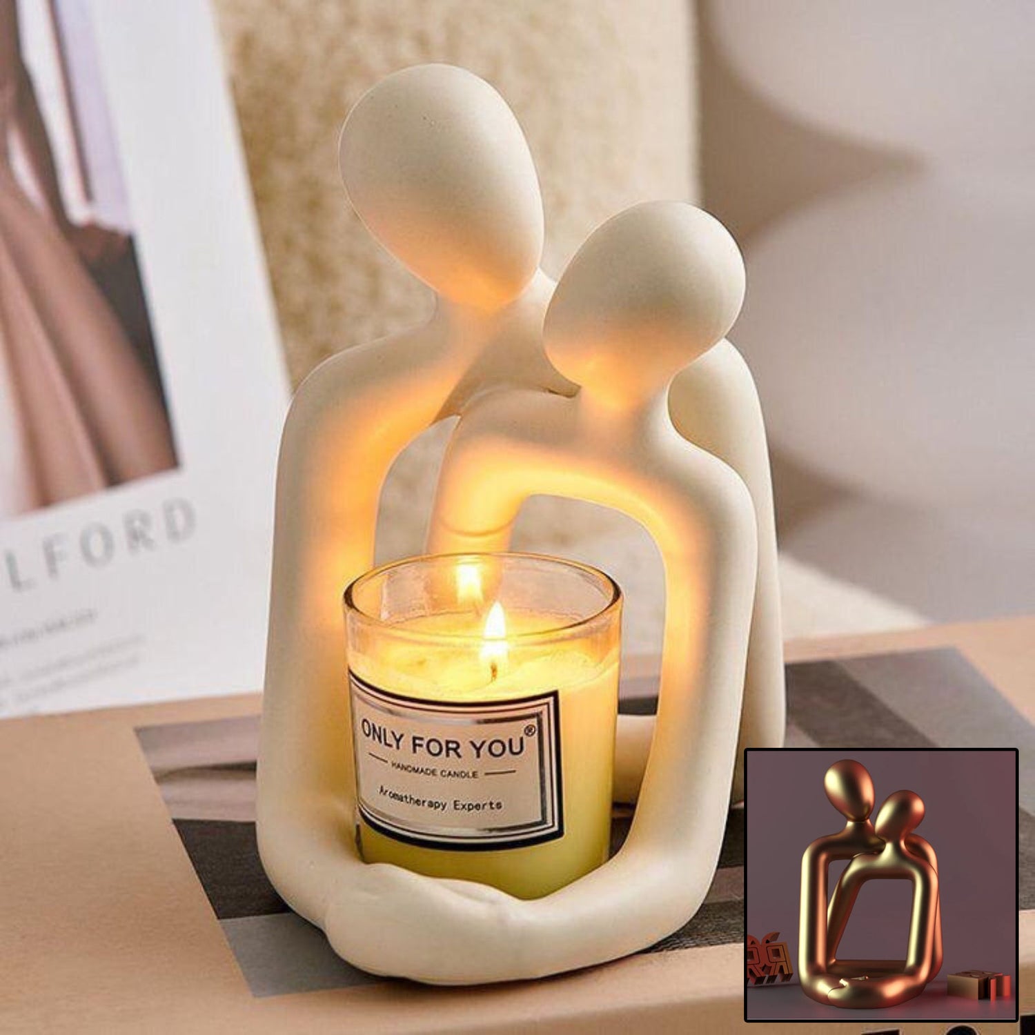 Decorative candle holder shaped like a couple with a lit candle inside, placed on a surface.
