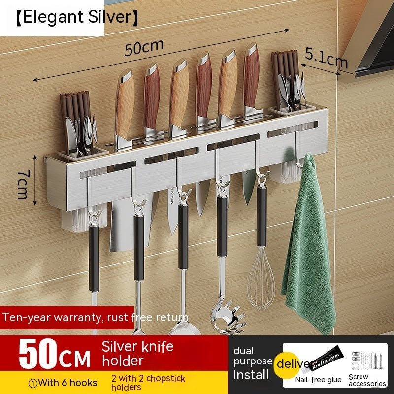 Wall-mounted knife and utensil holder with measurements on a wooden background