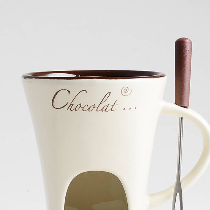 White mug with brown interior, handle, and 'Chocolat' text on a white background