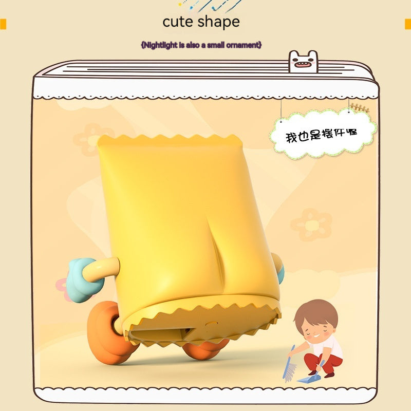 Yellow children's toy with cartoon character on a beige background