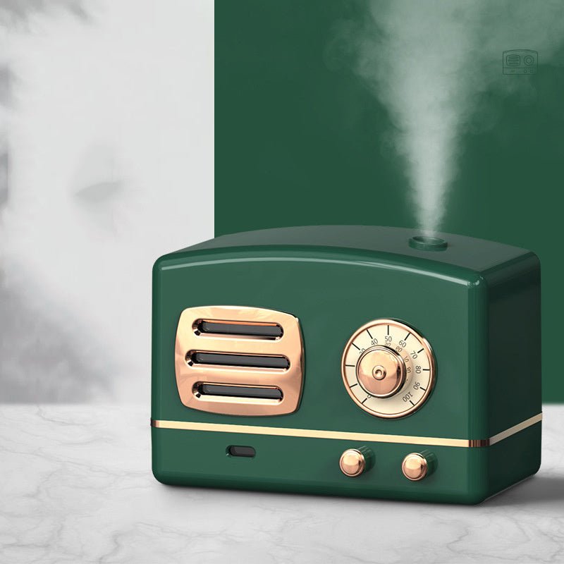 Vintage-style green and gold humidifier emitting mist against a green background