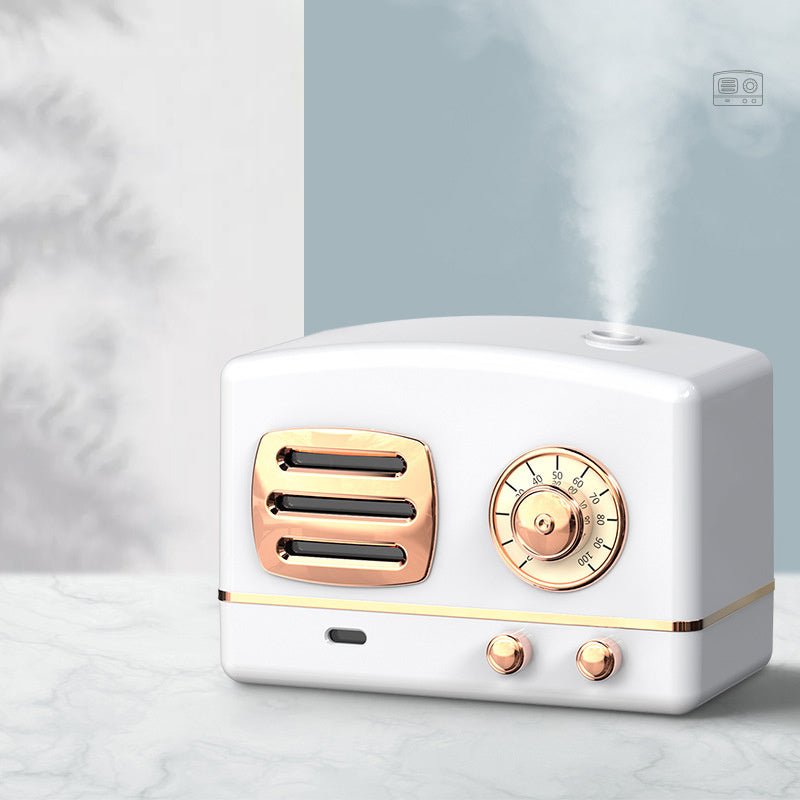 White and rose gold humidifier on a light gray background