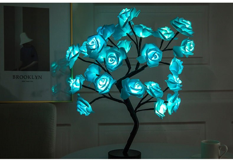 Decorative LED flower lamp with blue lights on a dark background