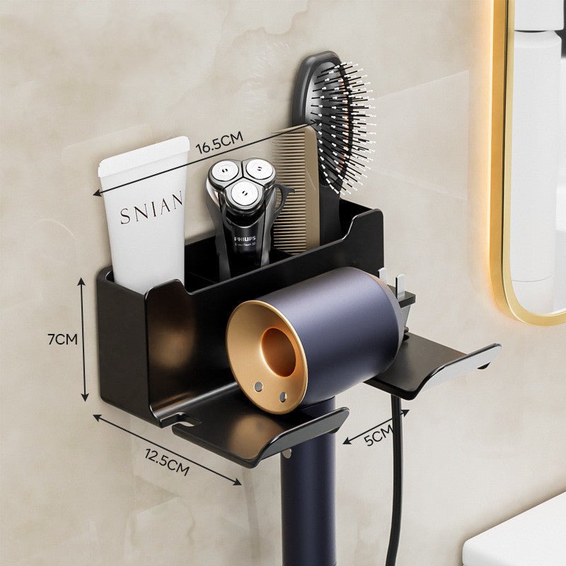 Wall-mounted hair dryer holder with hairbrush, shaver, and hair dryer on a beige wall.
